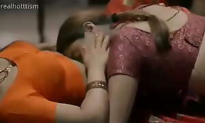 Hot column in saree giving a kiss